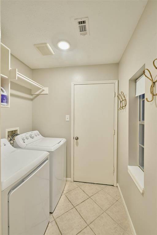 The home features an interior laundry room with a window.