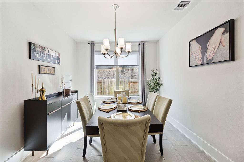 This is the dining room located off the open living area and close to the kitchen.