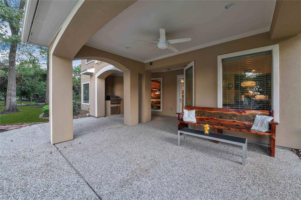 From the covered paOo, take in the tranquil views of this amazing backyard. On the back side of the pool, you'll find an inviOng sundeck, perfect for lounging and soaking up the sun.