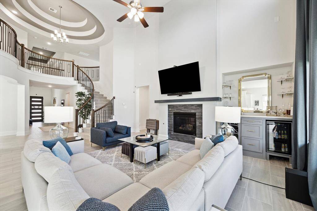 This view of the family room shows the built in "bar area" next to the fireplace that was added.