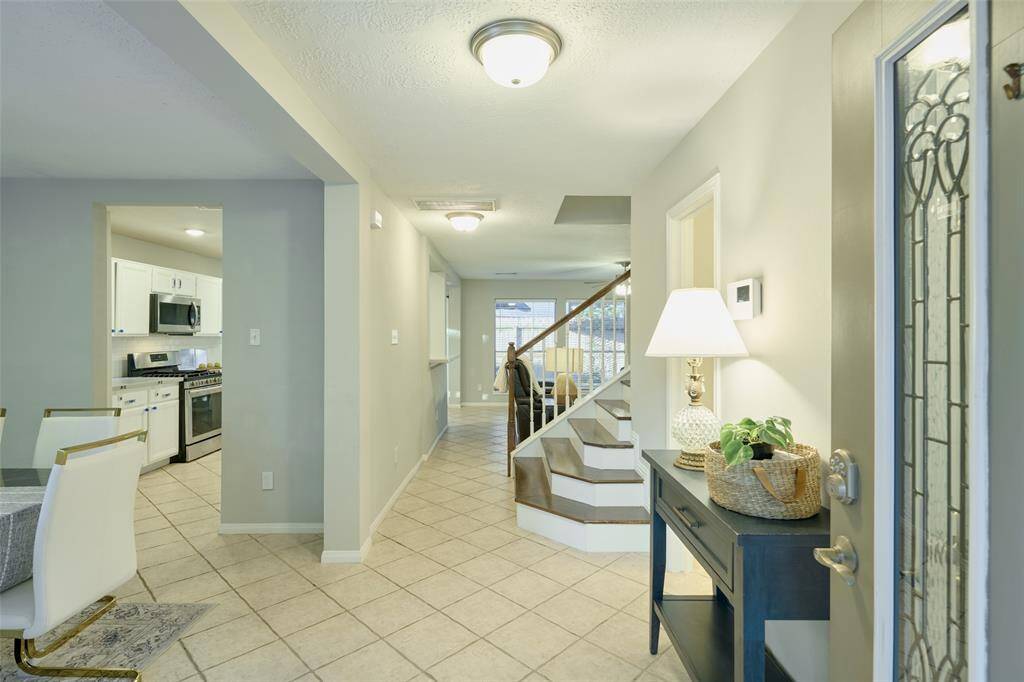 In the entryway, you are greeted with a dining room to the left.