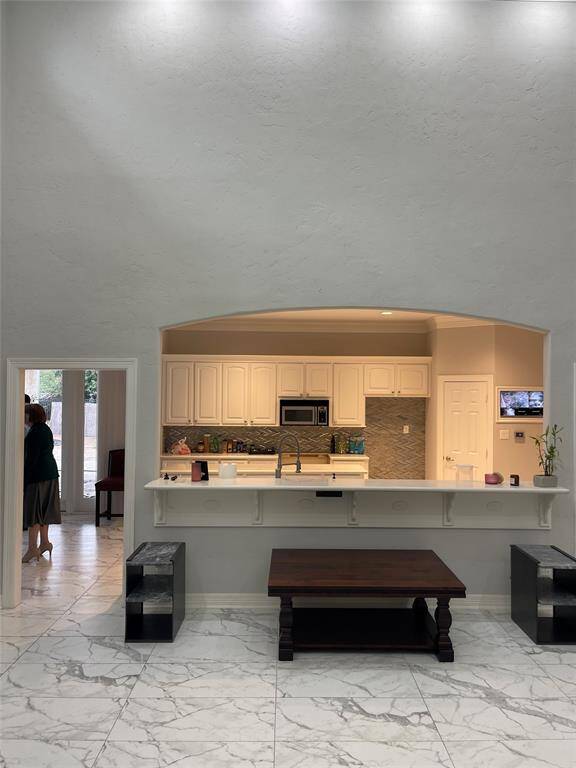 Kitchen over looking living room