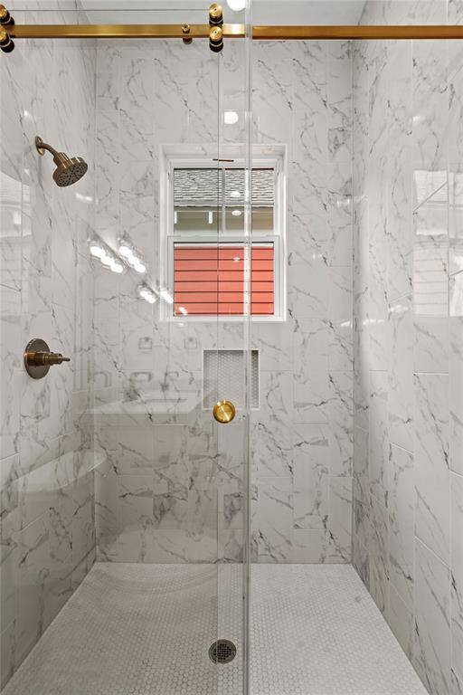 Better view of the spacious primary walk in shower.