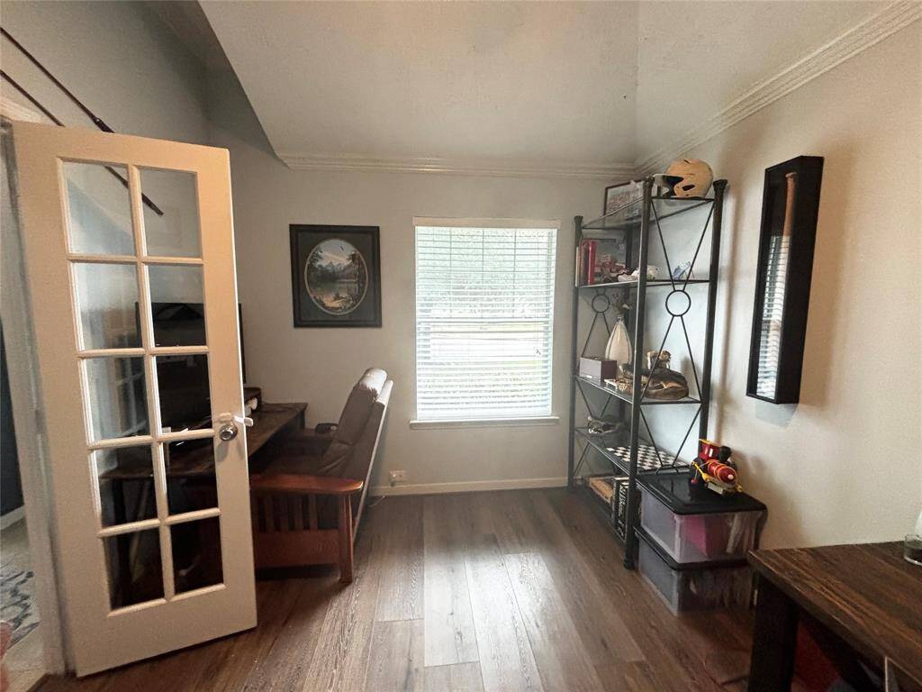 Large office/study! Great option for a 4th bedroom! Currently fits two desks, displays and craft supply carts!