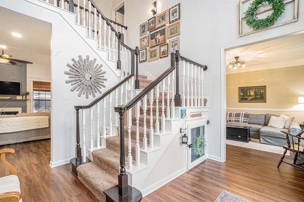 Built-in dog kennel under stairs perfect for your furry friend or extra storage