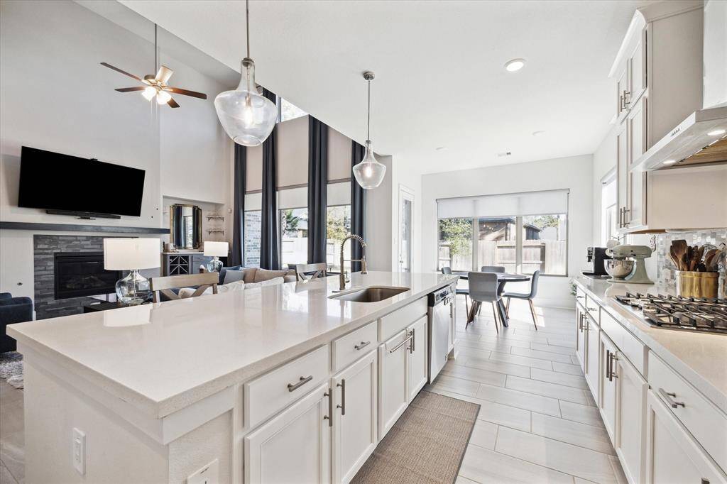 This kitchen has plenty of cabinet space and a walk in pantry!