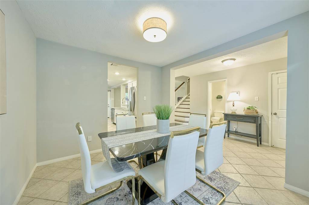The dining area leads you to the foyer or the kitchen area.