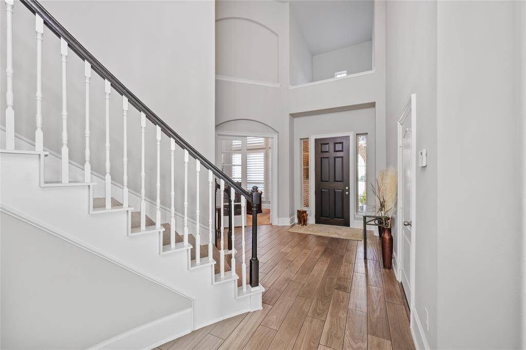 A reverse view of the entry shows the layout with the study to the left and the door to the garage on the right.