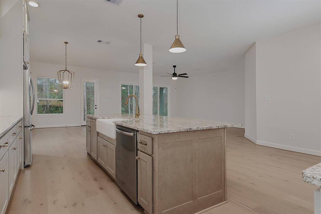 Kitchen overlooking the family room and dining areas