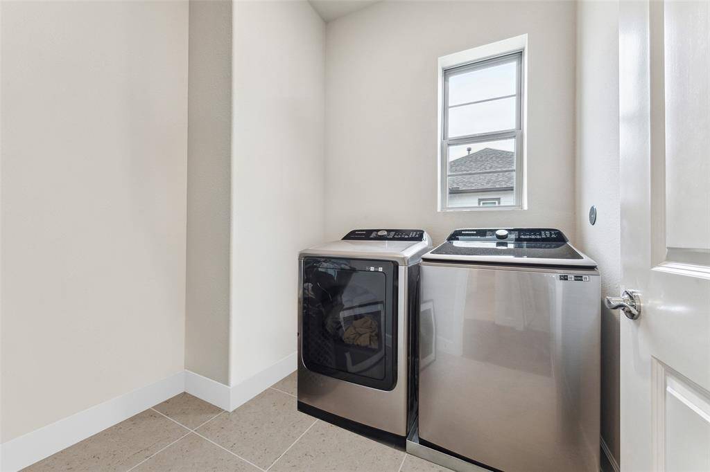 The laundry room is located on the second floor and offers a spacious and practical layout. This room is thoughtfully designed to maximize efficiency and comfort, providing ample space for all your laundry needs. Its convenient placement on the second level ensures easy access, making household chores more manageable and streamlined.