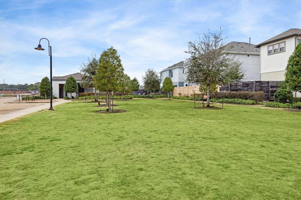 The neighborhood is thoughtfully equipped with other features that contribute to a welcoming and convenient living environment.