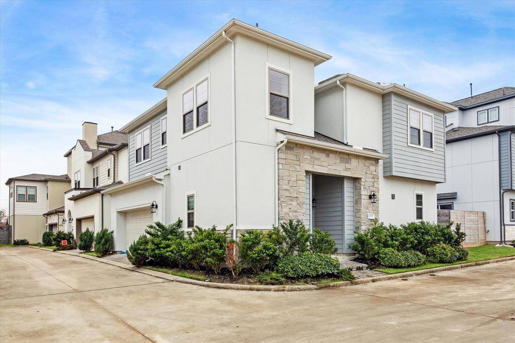 This residence occupies a prime corner lot within a secure, gated community, directly across from convenient parking for guests. With its unique location, the home offers both privacy and easy access to visitor parking, enhancing its appeal.