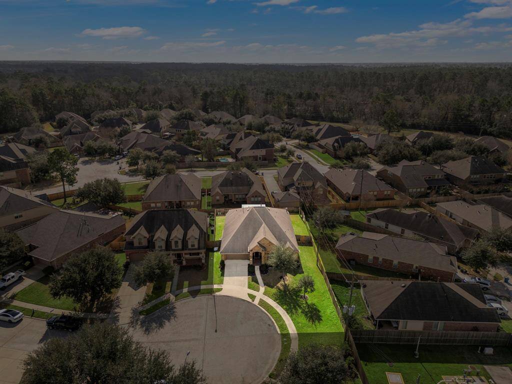 Nestled in a serene cul-de-sac, this Spring Trails property boasts a prime location with a generously-sized lot. The brick and stone exterior complements the lush landscaping, while the 3-car tandem garage offers convenience. Enjoy nearby community amenities, award-winning schools, and easy access to parks and shopping.