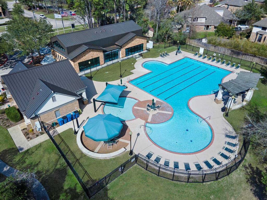 Experience resort-style living with this expansive community pool, complete with shaded seating areas and beautifully landscaped surroundings. Ideal for relaxation and recreation, the amenity-rich Spring Trails neighborhood offers a vibrant lifestyle for residents to enjoy year-round.