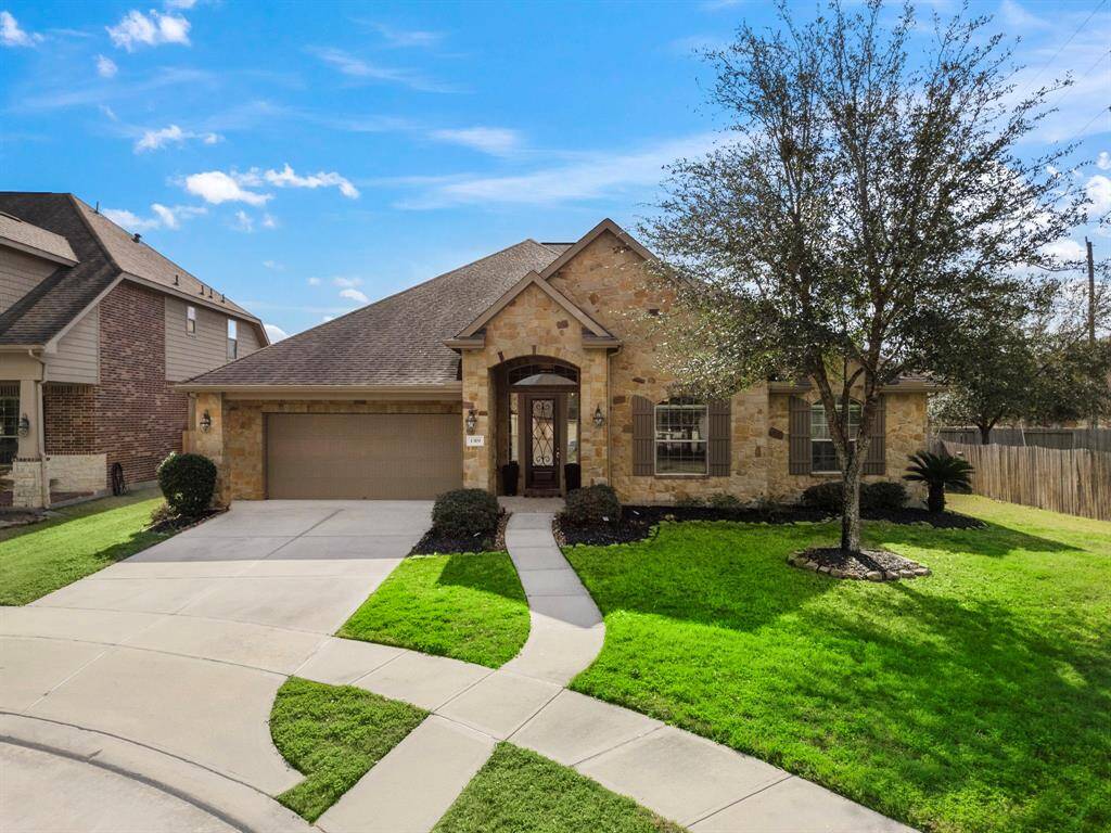 Located in a peaceful cul-de-sac, this single-story home features a timeless brick and stone exterior. The covered archway entry invites you into elegant interiors, while the 3-car tandem garage provides ample parking. Set amidst lush landscaping, the property offers refined living in the Spring Trails community with top-notch amenities.