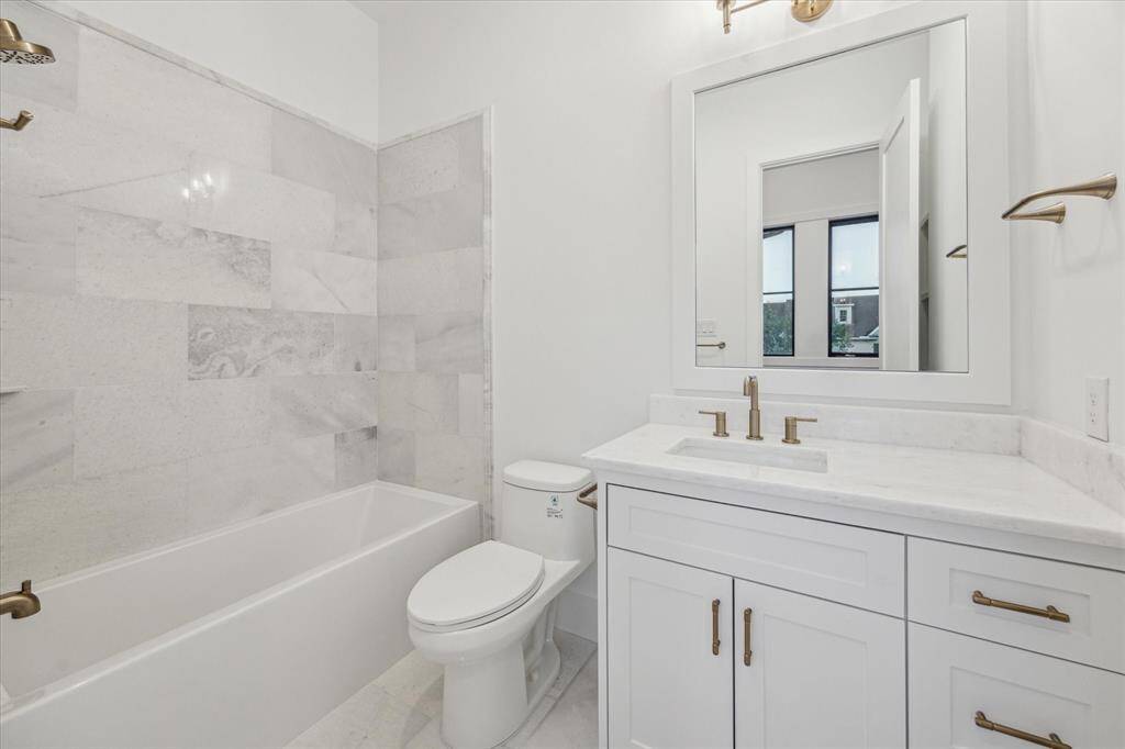 One of three ensuite baths.
