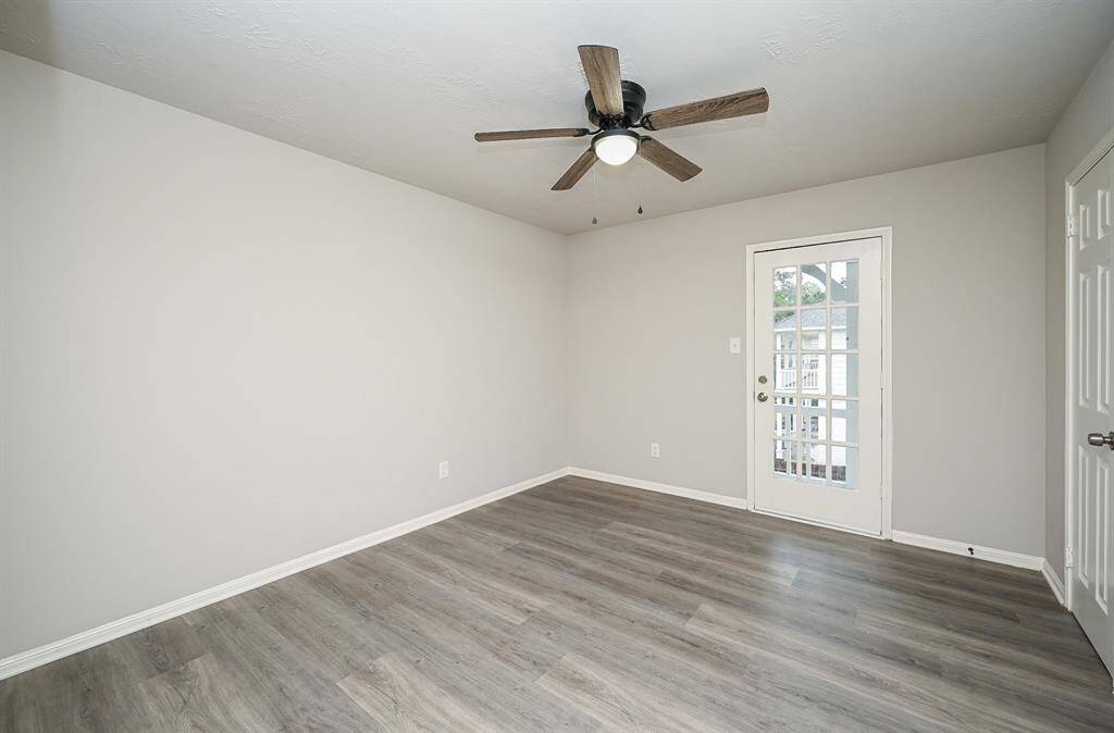 Upstairs primary bonus!  A french door to balcony!