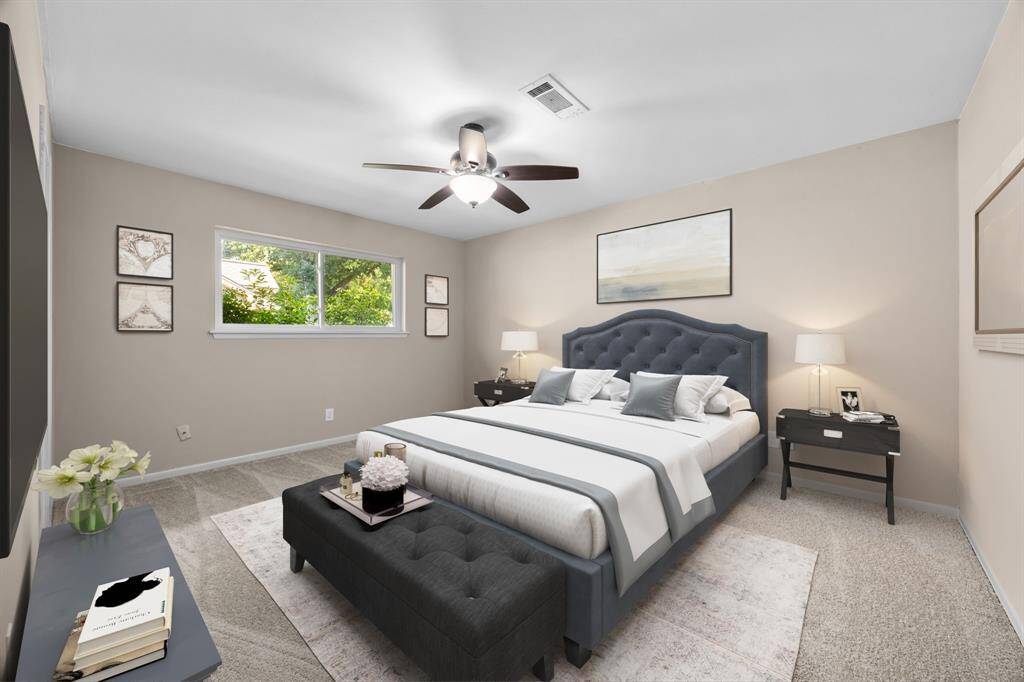Experience the potential of this elegantly virtually staged bedroom, designed to inspire your home vision of the primary bedroom.