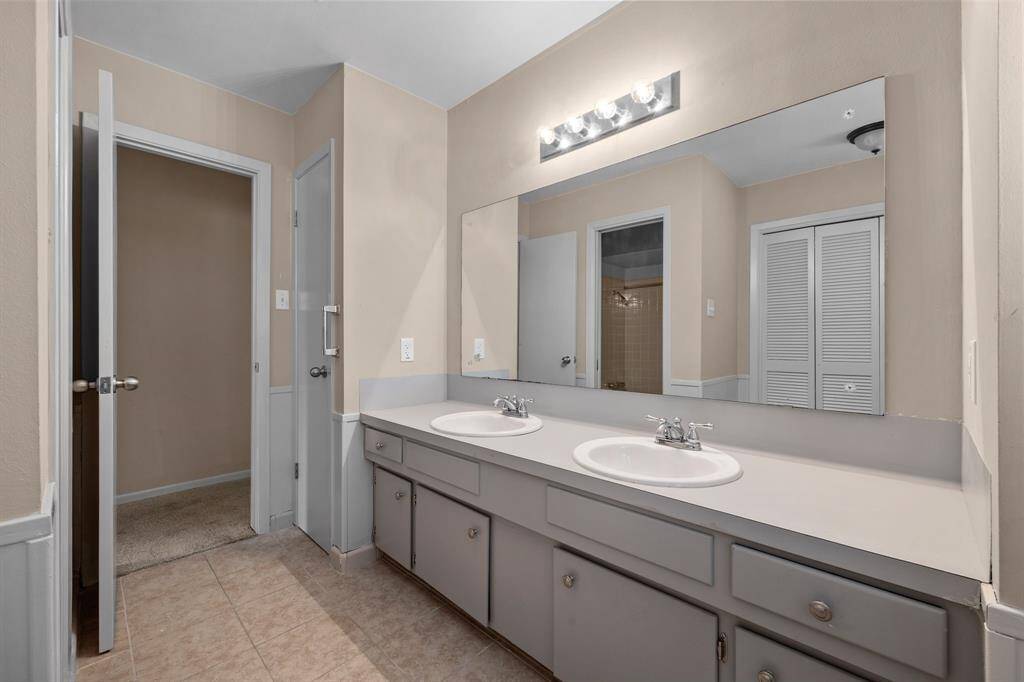 Updated bathrooms with fresh paint, new sinks, and cabinetry.