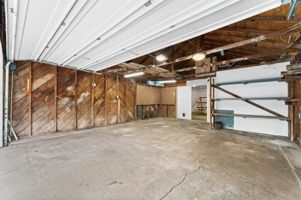 Two car garage with door on you upper right leading to the flex room.