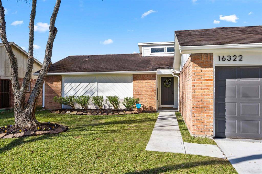 New landscaping, exterior paint, front door, sidewalk and driveway!