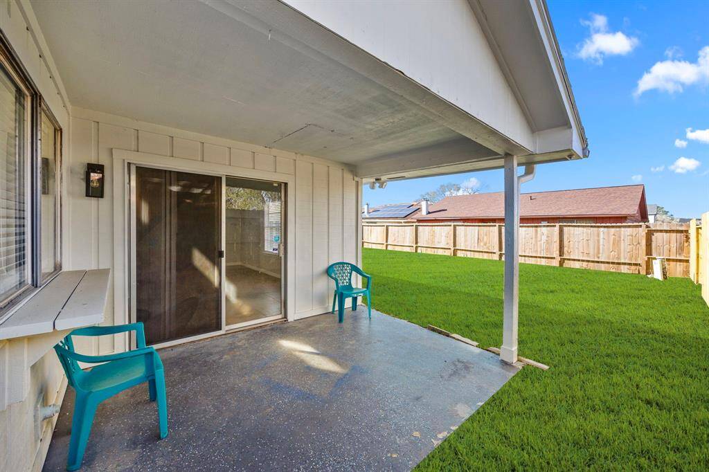 The covered back patio, perfect for relaxing!