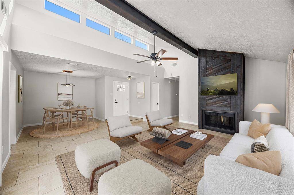 Bright and inviting living/dining area (virtually staged)