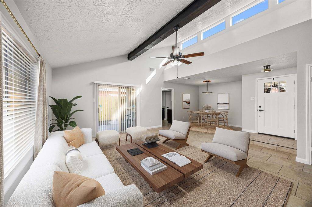 Alternate view of living/dining area (virtually staged)