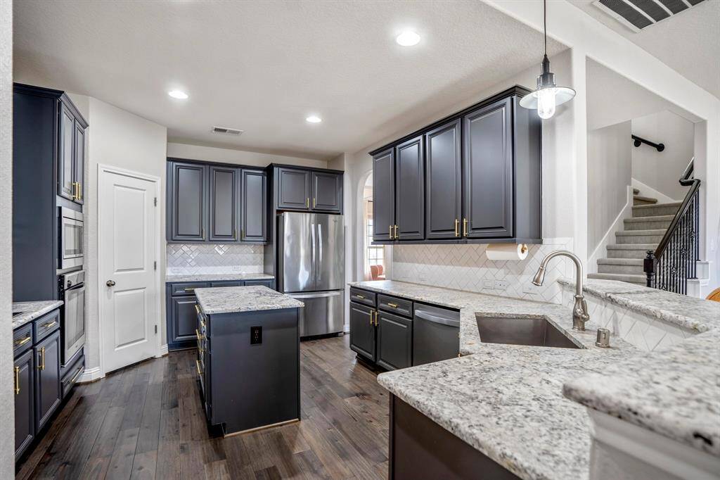 Your family and guests will enjoy many nights of fun, food and entertainment with ample counter space and kitchen island for setting up a wonderful array of provisions!