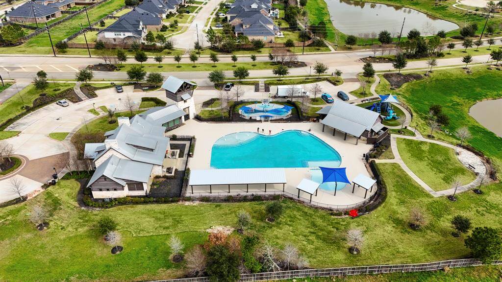 Welcome to the Young Ranch Amenity Center! This area features a ppol, playground, splash pad, and recreation center!