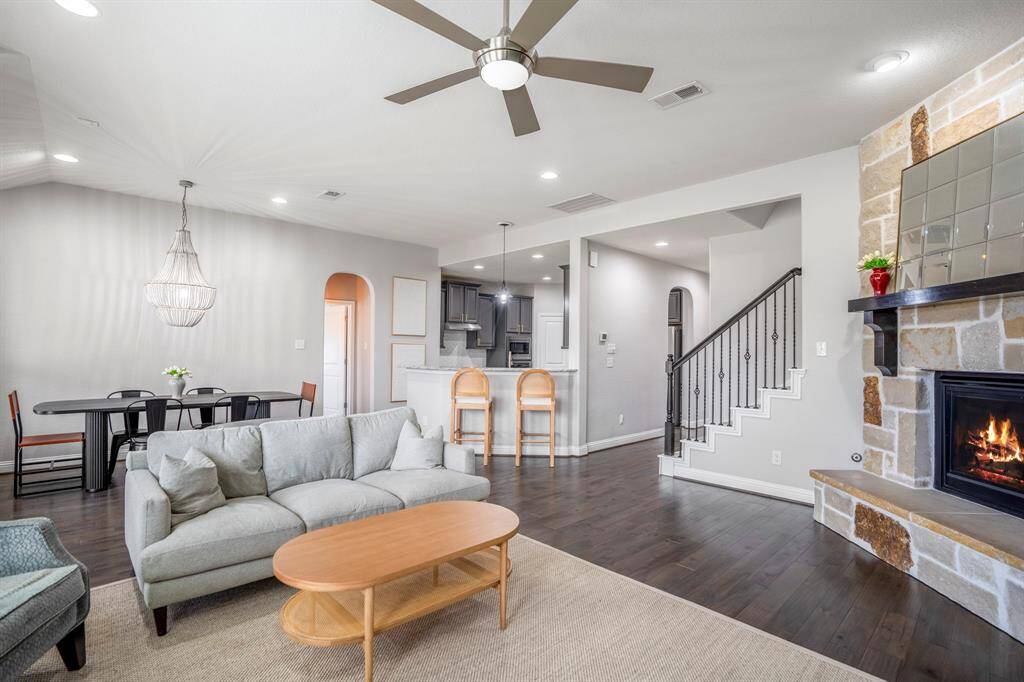 The open concept living room and kitchen makes for a great way to keep the party going and never miss a beat!