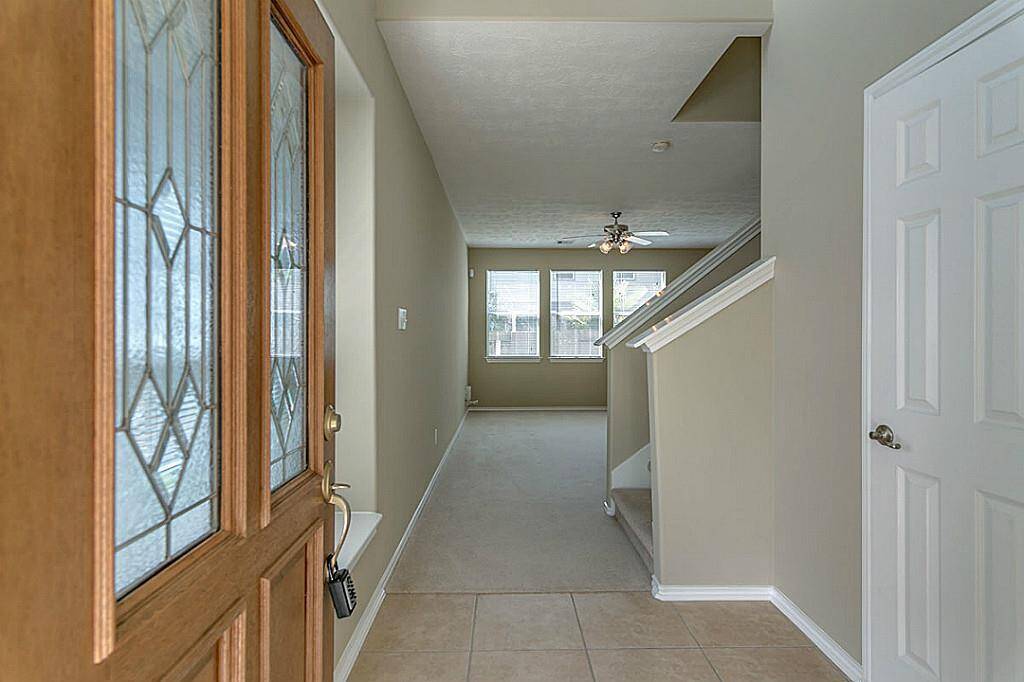 Welcome to 19 Wickerdale!Bright and spacious entry way leading to the Kitchen/Living room area.
