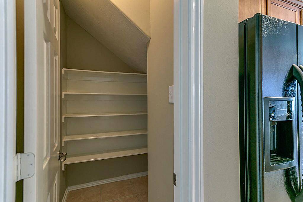 Walk-in pantry in the Kitchen.