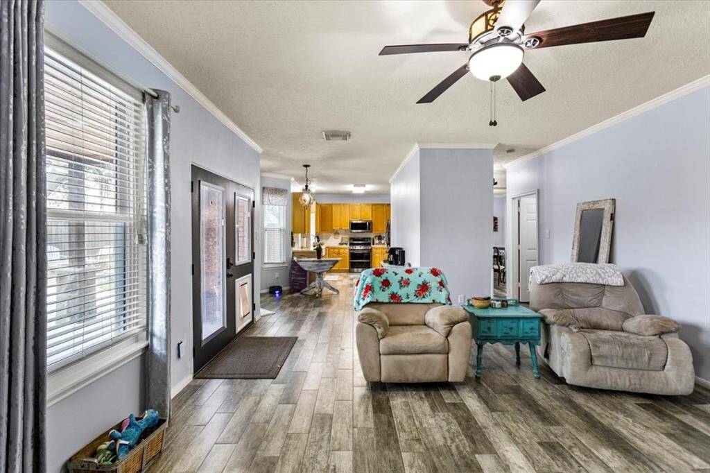 Flows into kitchen and to backyard