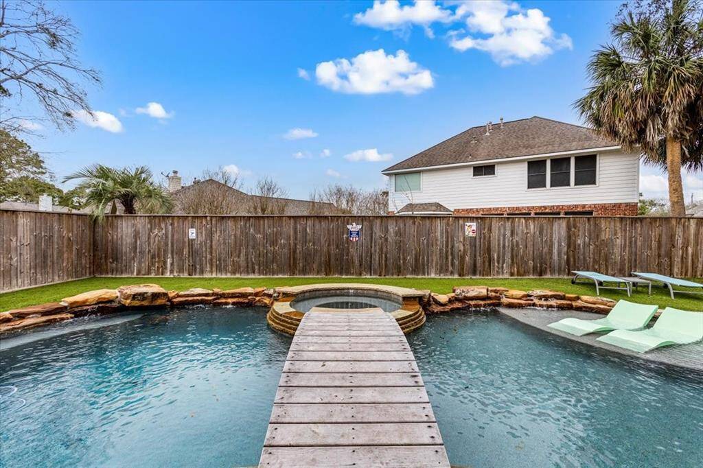 Follow the bridge to the hot tub