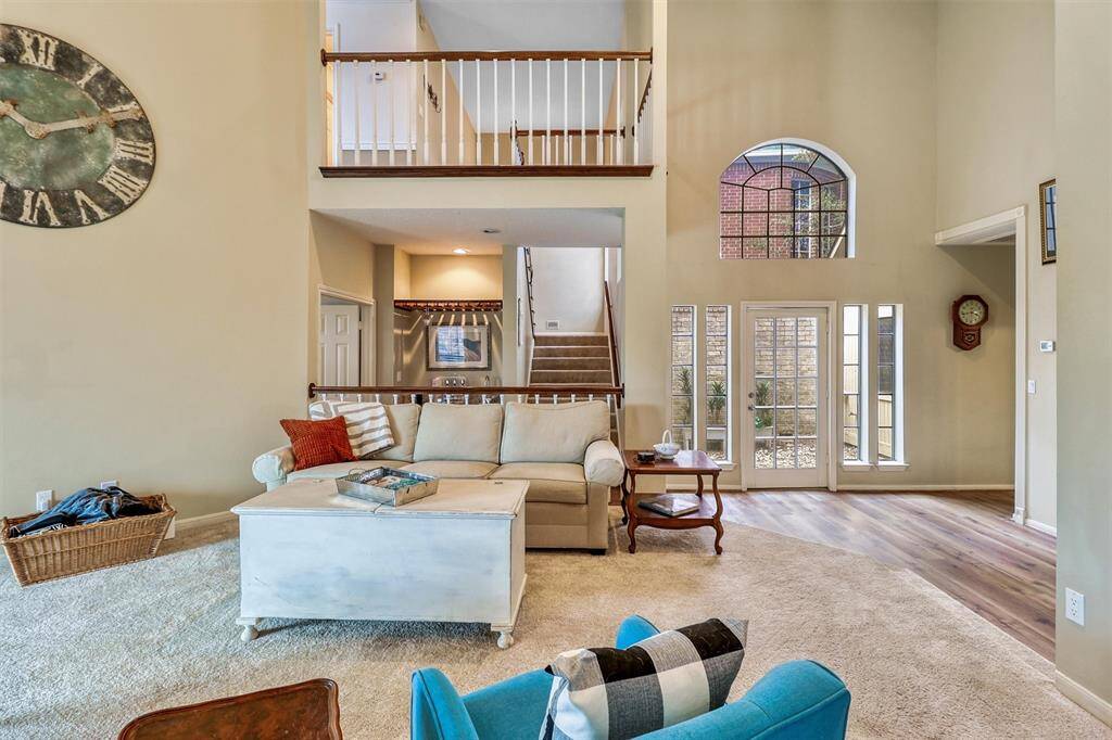 Soaring openness to this large beautiful family room.