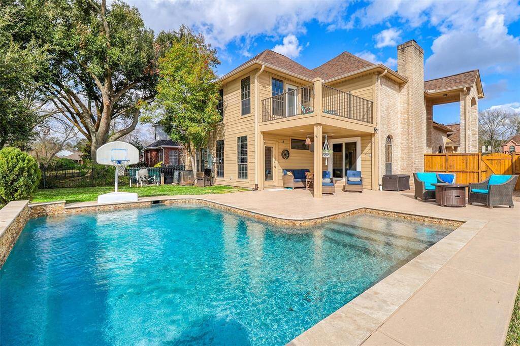 Think of all the summertime fun in this beautiful inviting pool and large patio area ideal for leisure or entertaining family or friends!