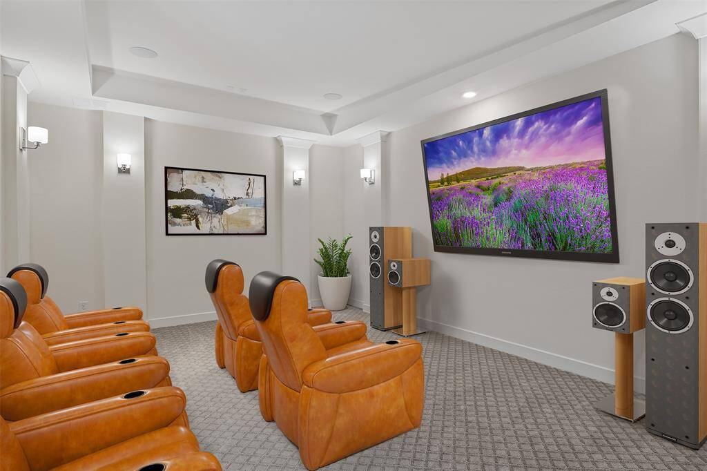 Experience the ultimate entertainment in a beautiful virtually staged media room.