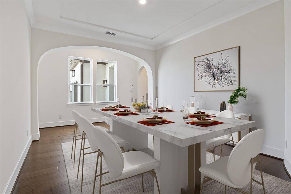 Formal dinning room virtually staged.