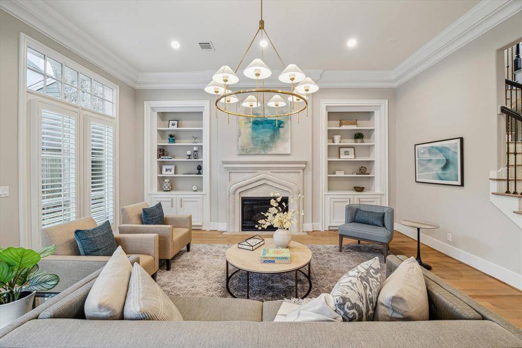 Note the triple crown molding, carpentry details you rarely see in newer construction today. For extra privacy the current owners installed plantation shutters in this room and around the home.