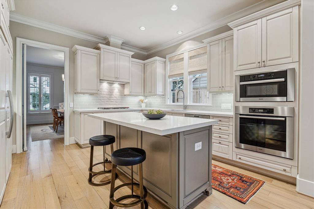 Expect no less than high end appliances with a Sub Zero refrigerator, Meile dishwasher and oven and a new Wolf 5 burner gas range.