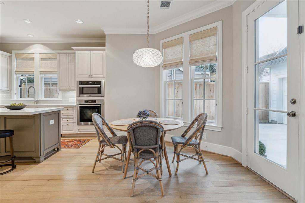 Note the updated light fixture from Serena and Lily.  The addition of new woven window shades are a nice touch of additional texture.   The door to the garage is on the right of this photo so its really easy to bring groceries in (covered breezeway).