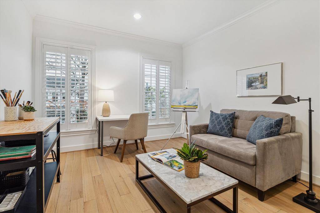 BEDROOM FOUR.  Located at the front of the home and currently used as an arts and crafts space. Note all three secondary bedrooms are elevator accessible.