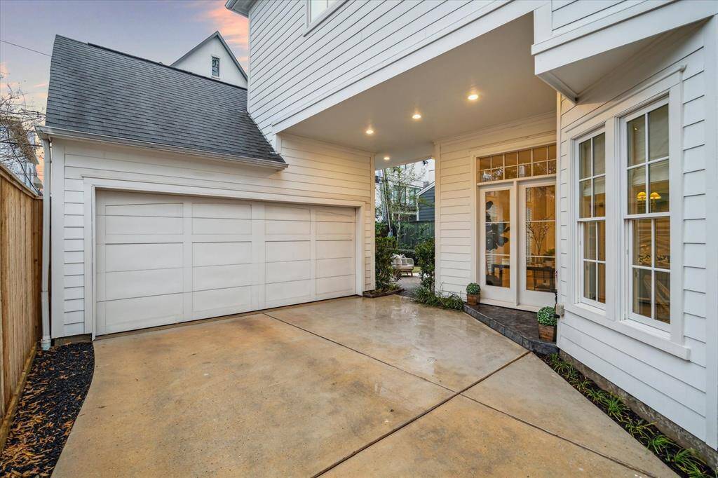 Private driveway with the gate means more security back here.  Plenty space to park cars.