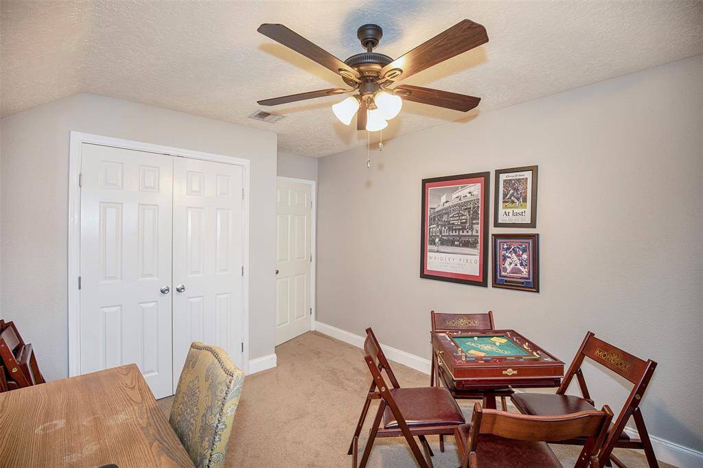 This updated additional bathroom located on 2nd floor features a sleek, modern design with a tiled shower area.
