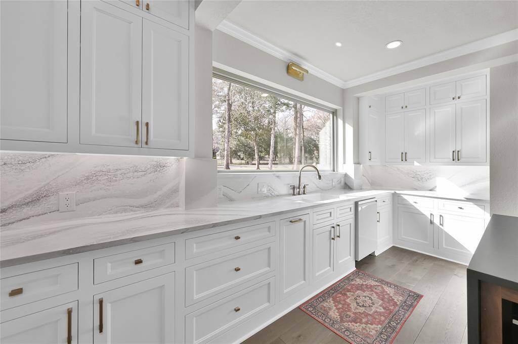 Another view of this stunning kitchen with huge views and storage galore.