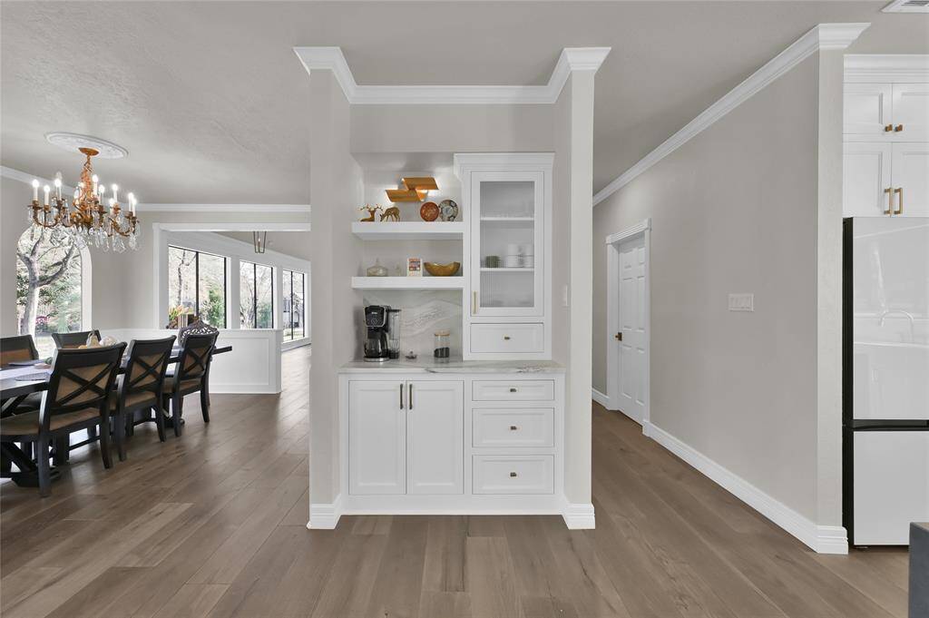 So many ways to use the storage in this space although at present it serves perfectly as a coffee bar.