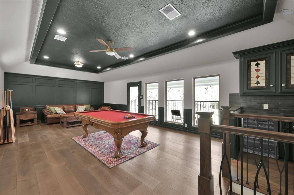 As we move upstairs we are greeted by a huge gameroom and bar area.
