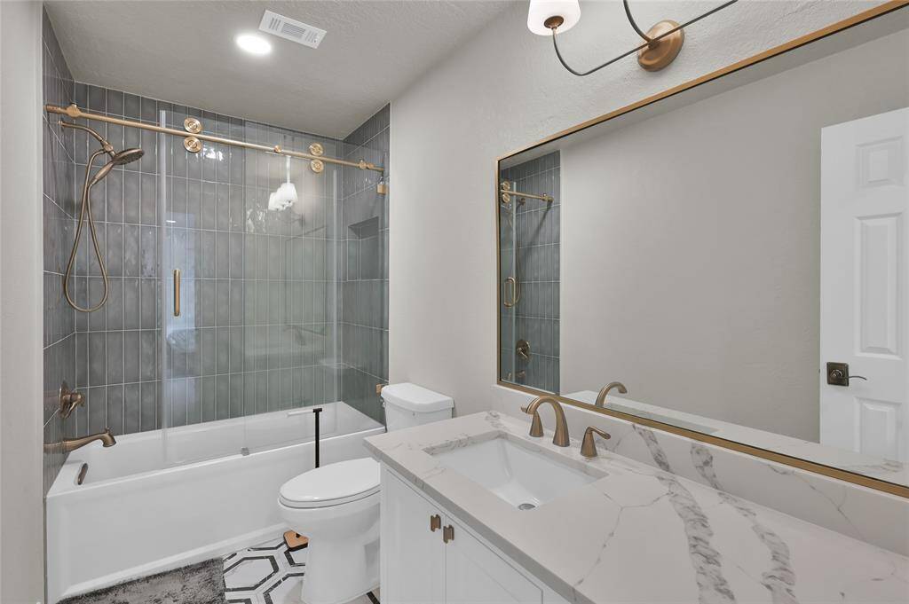 In-suite bathroom fully renovated in bedroom #2.