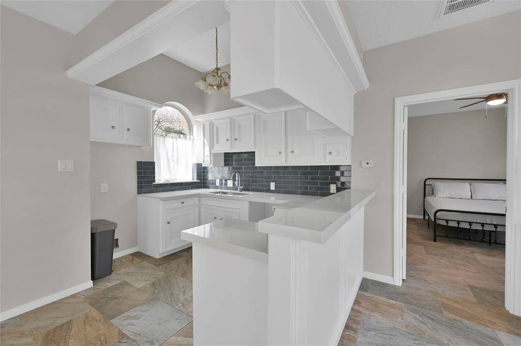 This well laid out kitchen is newly renovated and is ready for appliances of your choice.